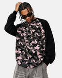 model upper body wearing pink camo raglan long sleeve tee
