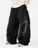 model wearing black faux fur trim barrel sweatpants front view