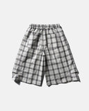 front view of grey white plaid cropped shorts