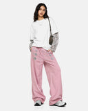 full body model styling pink button detail wide leg sweatpants