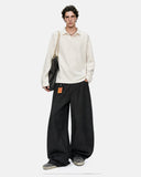 flat lay of wide leg washed denim jeans front