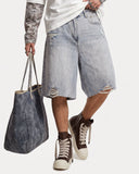 light wash baggy jorts with side waist tabs