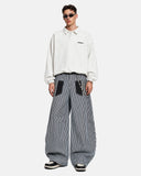 striped baggy jeans styled with streetwear outfit