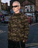 model front view wearing camo waffle hoodie