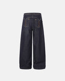 black raw denim jeans with lace-up waistband detail