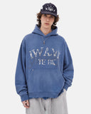 model wearing blue washed rhinestone graphic hoodie front view
