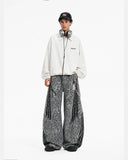 full-body model styling grey leopard barrel jeans with sweatshirts