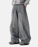 Blue washed denim jeans with star patch