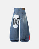blue 95 graphic barrel jeans back view