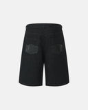 black denim jorts back view with textured pockets