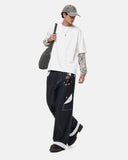 full-body styling with polka dot baggy jeans