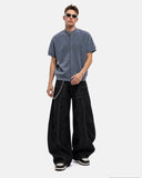 black baggy jeans styled with streetwear outfit