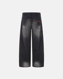 faded black wide-leg denim jeans with oversized pockets