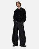 model wearing black suede clasp jacket full-body front view