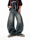 curved seam detail on denim pants