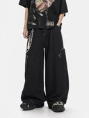 model wearing leopard pocket raw barrel jeans